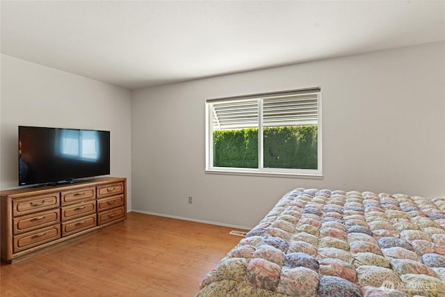 695 S Lyle Ave, East Wenatchee, WA 98802 - bedroom with light wood-type flooring and baseboards