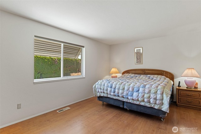 695 S Lyle Ave, East Wenatchee, WA 98802 - bedroom featuring wood finished floors and baseboards
