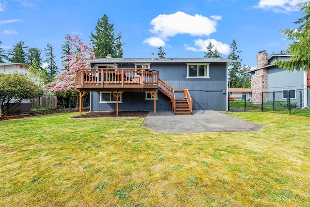 2202 28th Ave SE, Puyallup, WA 98374 - back of house with a wooden deck, a patio, stairs, and a chimney