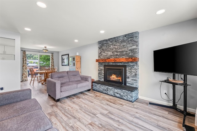 2202 28th Ave SE, Puyallup, WA 98374 - living room with a fireplace, light wood-type flooring, and recessed lighting