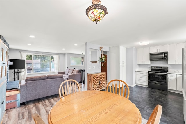 2202 28th Ave SE, Puyallup, WA 98374 - dining space featuring wood finished floors and recessed lighting