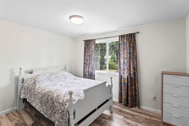 2202 28th Ave SE, Puyallup, WA 98374 - bedroom with wood finished floors and baseboards