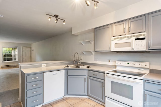 9817 132nd Street Ct E Unit B, Puyallup, WA 98373 - kitchen featuring white appliances, a sink, and gray cabinetry