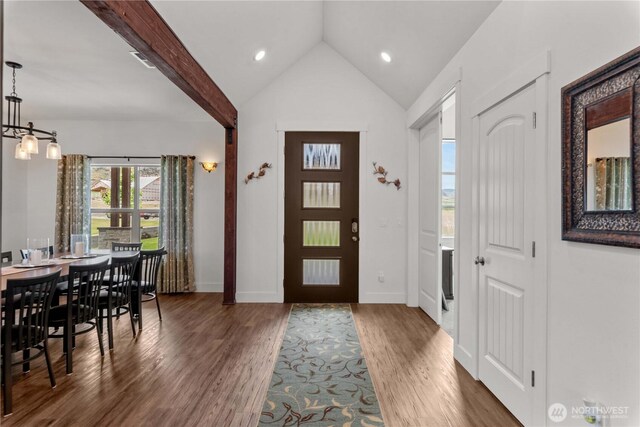 179 N Shore Dr, Orondo, WA 98843 - foyer with lofted ceiling, wood finished floors, baseboards, a chandelier, and recessed lighting