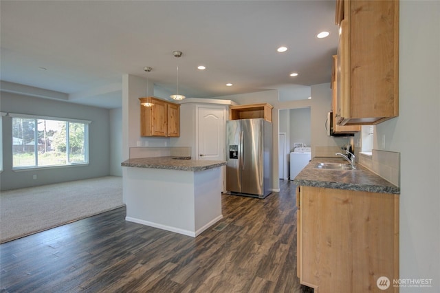 114 Mark Ct SE, Ocean Shores, WA 98569 - kitchen featuring stainless steel fridge with ice dispenser, a sink, recessed lighting, dark wood-style flooring, and open floor plan