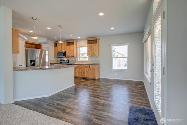 114 Mark Ct SE, Ocean Shores, WA 98569 - kitchen featuring appliances with stainless steel finishes, dark wood finished floors, recessed lighting, a peninsula, and baseboards