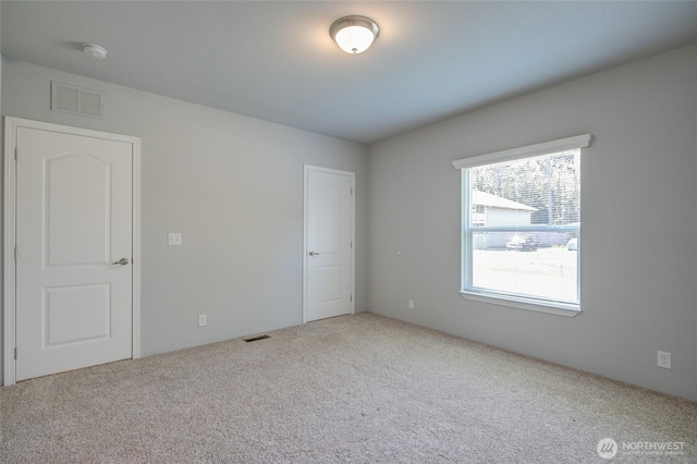 114 Mark Ct SE, Ocean Shores, WA 98569 - carpeted empty room featuring a smoke detector