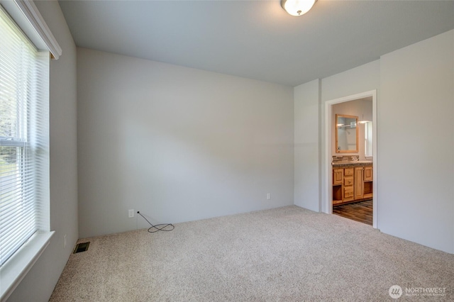 114 Mark Ct SE, Ocean Shores, WA 98569 - unfurnished bedroom featuring carpet flooring and ensuite bath