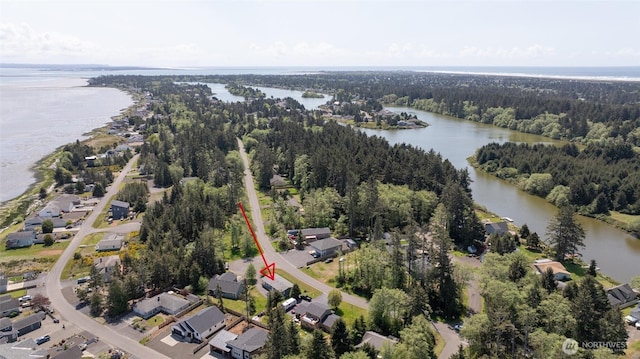 114 Mark Ct SE, Ocean Shores, WA 98569 - view of property location featuring a nearby body of water and a heavily wooded area