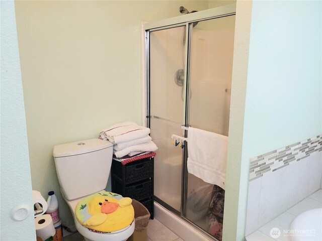 10409 137th St E Unit 9, Puyallup, WA 98374 - bathroom featuring a shower stall and toilet