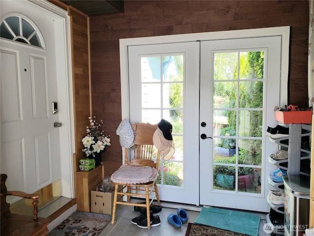 10409 137th St E Unit 9, Puyallup, WA 98374 - doorway with french doors and wood walls