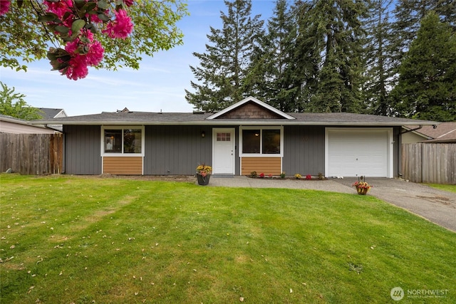 5510 83rd Ave W, University Place, WA 98467 - view of front of home featuring driveway, a garage, and board and batten siding