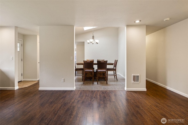 5510 83rd Ave W, University Place, WA 98467 - dining room with a chandelier, hardwood / wood-style flooring, and baseboards