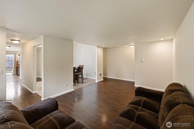 5510 83rd Ave W, University Place, WA 98467 - living room featuring dark wood-type flooring and baseboards