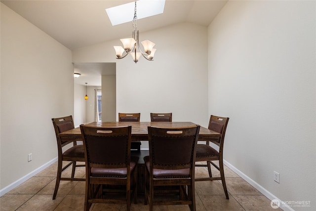 5510 83rd Ave W, University Place, WA 98467 - dining room featuring a skylight, vaulted ceiling, a chandelier, tile patterned flooring, and baseboards