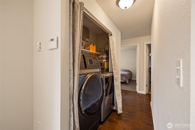 5510 83rd Ave W, University Place, WA 98467 - laundry area featuring wood finished floors and baseboards