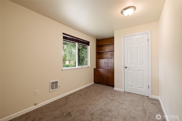 5510 83rd Ave W, University Place, WA 98467 - unfurnished bedroom featuring carpet flooring and baseboards
