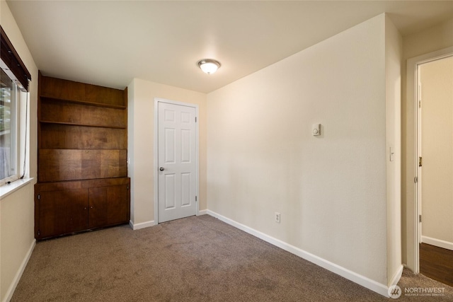 5510 83rd Ave W, University Place, WA 98467 - unfurnished room with baseboards and carpet floors
