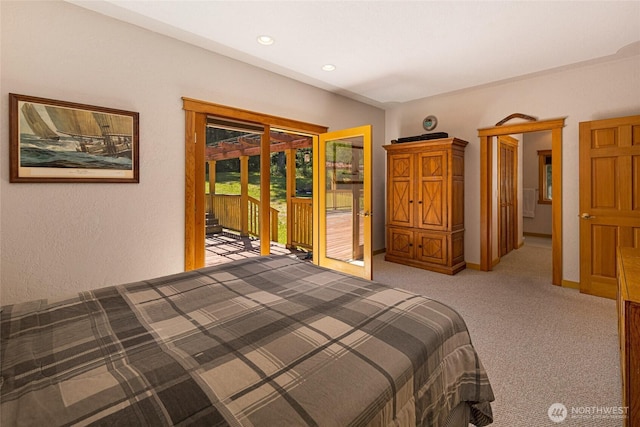 591 Wold Rd, Friday Harbor, WA 98250 - unfurnished bedroom featuring access to exterior, light colored carpet, recessed lighting, baseboards, and a textured wall