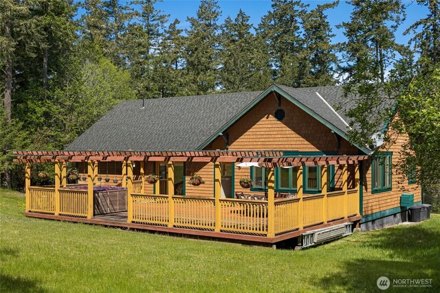 591 Wold Rd, Friday Harbor, WA 98250 - back of property featuring a shingled roof, a yard, a wooden deck, and cooling unit