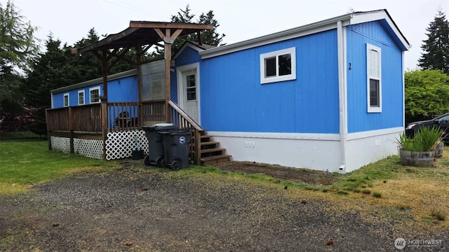 1900 Broadway Ave Unit 2, Hoquiam, WA 98550 - view of front of home with crawl space and a deck