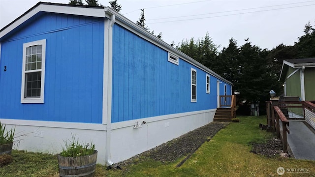 1900 Broadway Ave Unit 2, Hoquiam, WA 98550 - view of home's exterior featuring crawl space and a yard