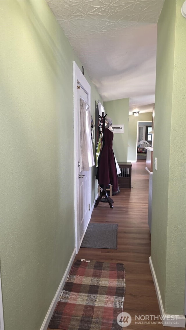 1900 Broadway Ave Unit 2, Hoquiam, WA 98550 - hallway featuring wood finished floors and baseboards