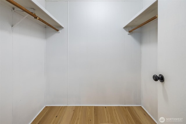 spacious closet with wood finished floors