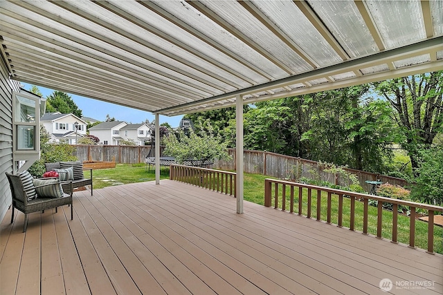 wooden terrace featuring a residential view