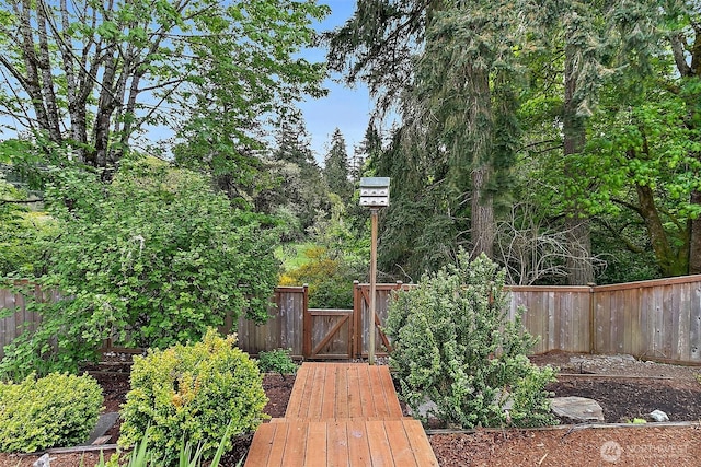 deck featuring a fenced backyard