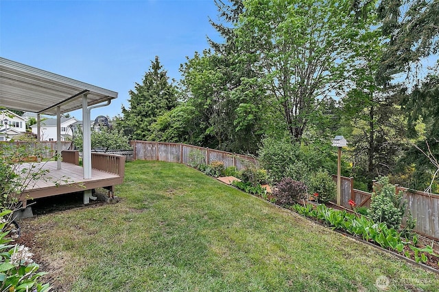 view of yard featuring a deck