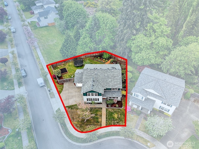 aerial view of property and surrounding area featuring property boundaries highlighted