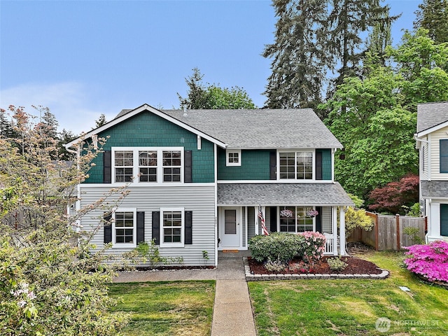view of front of house featuring a shingled roof