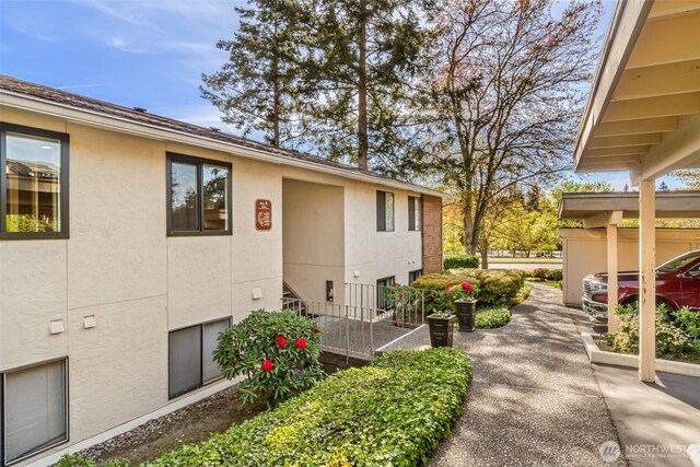 view of home's exterior with stucco siding