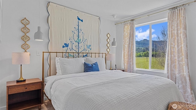 bedroom with a mountain view