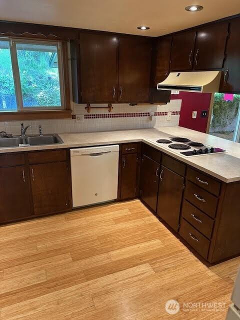 816 Sunrise Ln, Centralia, WA 98531 - kitchen with white appliances, a sink, light countertops, and recessed lighting