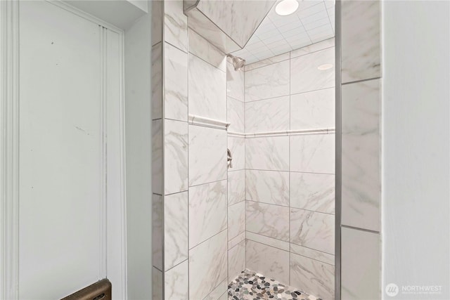 full bathroom with a shower stall
