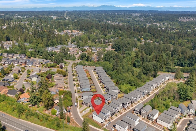 207 207th St SE Unit Eh49, Bothell, WA 98012 - aerial overview of property's location with a forest and nearby suburban area