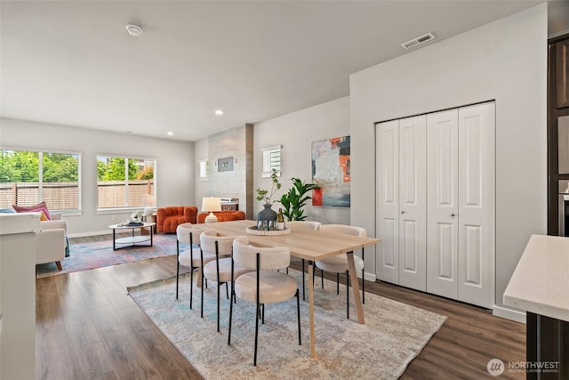 207 207th St SE Unit Eh49, Bothell, WA 98012 - dining space featuring dark wood-style flooring, recessed lighting, and baseboards