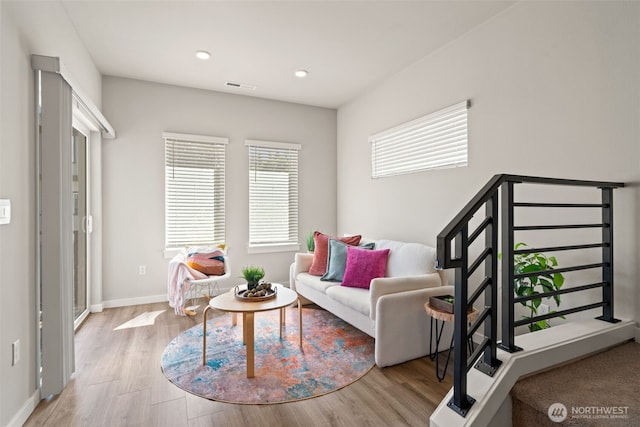 207 207th St SE Unit Eh49, Bothell, WA 98012 - living area with wood finished floors, baseboards, and recessed lighting