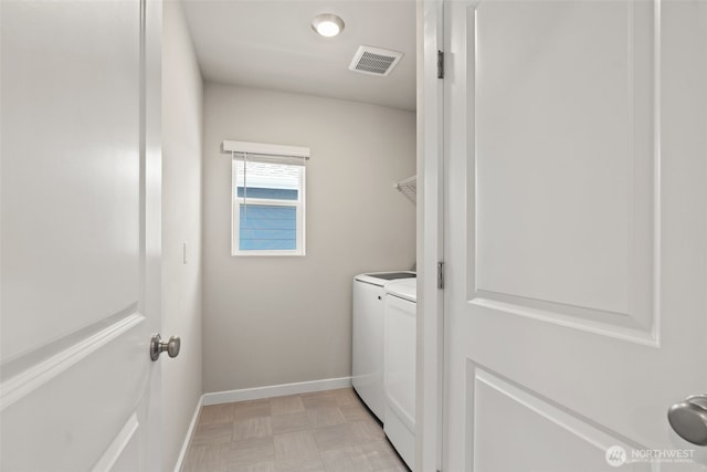 207 207th St SE Unit Eh49, Bothell, WA 98012 - laundry room featuring washing machine and clothes dryer and baseboards