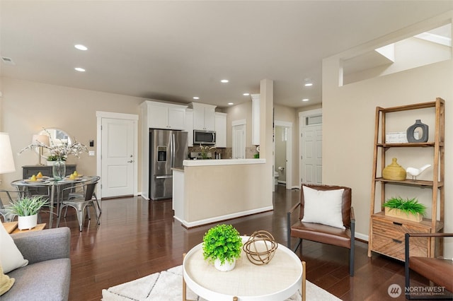 3723 218th Pl SE, Bothell, WA 98021 - living room with dark wood-style flooring, recessed lighting, and baseboards