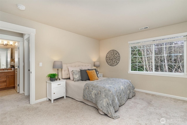 3723 218th Pl SE, Bothell, WA 98021 - bedroom with light carpet, baseboards, and a sink