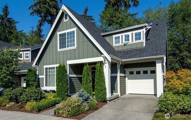 3723 218th Pl SE, Bothell, WA 98021 - craftsman inspired home featuring board and batten siding, a shingled roof, driveway, and an attached garage