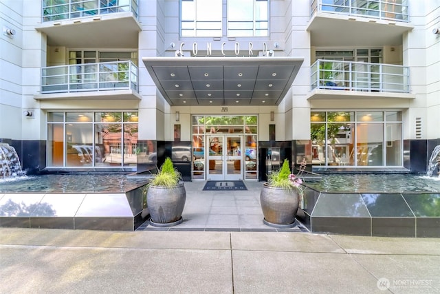 property entrance featuring french doors