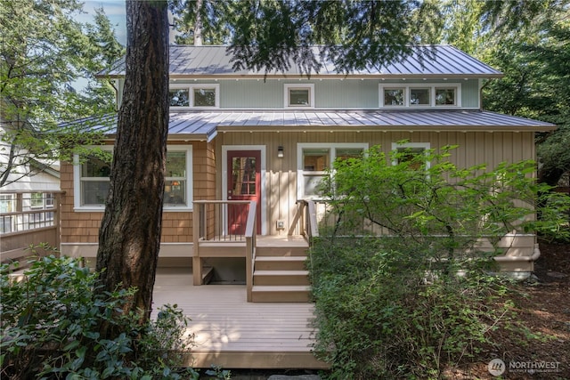 view of front facade featuring a standing seam roof and metal roof