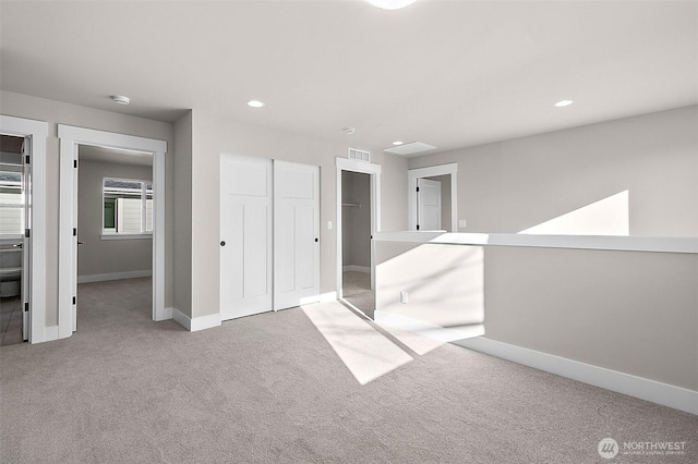 15709LOT12 SE 257th St, Covington, WA 98042 - unfurnished bedroom featuring carpet, baseboards, a closet, and recessed lighting