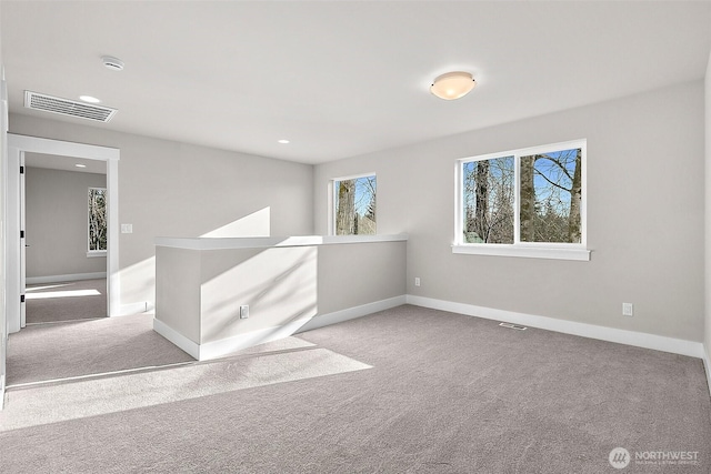 15709LOT12 SE 257th St, Covington, WA 98042 - unfurnished room featuring baseboards, carpet, and recessed lighting