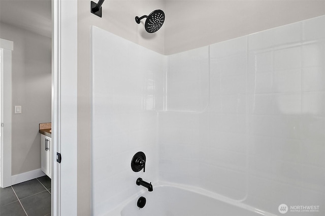 15709LOT12 SE 257th St, Covington, WA 98042 - bathroom featuring washtub / shower combination, tile patterned flooring, and baseboards