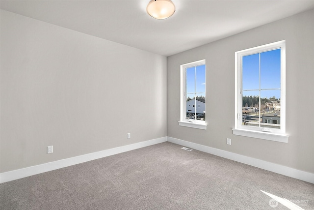 15709LOT12 SE 257th St, Covington, WA 98042 - carpeted spare room featuring baseboards